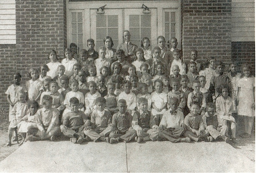 Lyles Station Consolidated School: Photo taken 1928. Vertus, Melvin, and Gletus Hardiman are pictured.